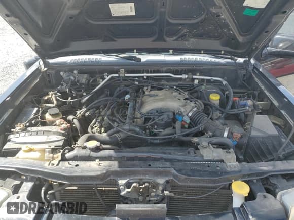 ✅ 2001 Nissan Frontier SE • VIN: 1N6ED27Y31C357963 • Lot: 84375445. Listed on Copart with 163,455 mi. Free auction sales archive from the USA and detailed vehicle history report at DreamBid. Image 11.