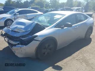 ✅ 2023 Toyota Prius LE • VIN: JTDACAAU2P3004496 • Лот: 43164149. Опубликован ранее на IAAI с пробегом 54 818 миль. Бесплатный доступ к архиву аукционных продаж из США и подробный отчёт об истории автомобиля на DreamBid. Изображение 2.