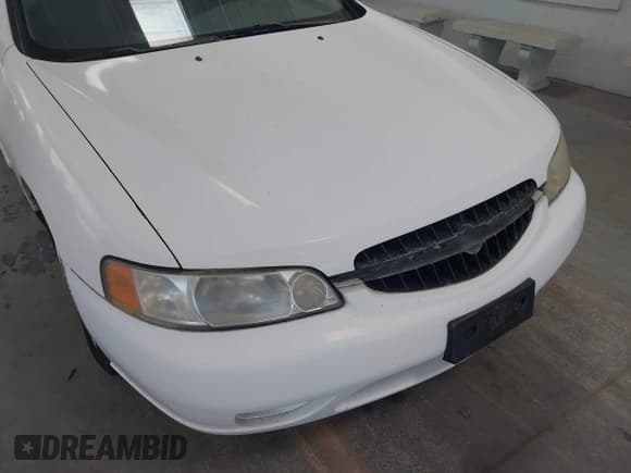 ✅ 2000 Nissan Altima XE • VIN: 1N4DL01D5YC210930 • Lot: 42263040. Wystawiony na IAAI z przebiegiem 113 060 mil. Bezpłatny archiwum sprzedaży aukcyjnych z USA i szczegółowy raport historii pojazdu na DreamBid. Zdjęcie 6.