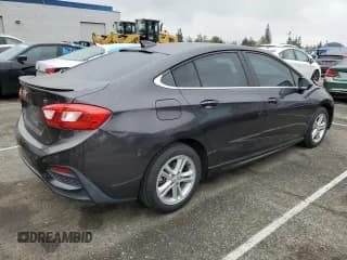 ✅ 2016 Chevrolet Cruze LT • VIN: 1G1BE5SM3G7286623 • Lot: 50615153. Listed on Copart with 88,693 mi. Free auction sales archive from the USA and detailed vehicle history report at DreamBid. Image 3.