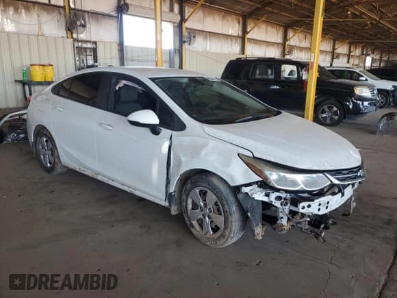 ✅ 2018 Chevrolet Cruze LS • VIN: 1G1BC5SMXJ7234130 • Lot: 80506215. Listed on Copart with Not provided. Free auction sales archive from the USA and detailed vehicle history report at DreamBid. Image 4.