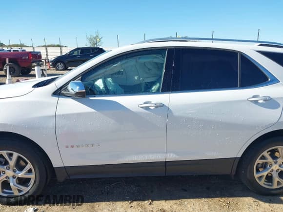 ✅ 2021 Chevrolet Equinox Premier • VIN: 3GNAXXEV2MS106680 • Лот: 43481192. Опубликован ранее на IAAI с пробегом 61 530 миль. Бесплатный доступ к архиву аукционных продаж из США и подробный отчёт об истории автомобиля на DreamBid. Изображение 14.