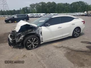 ✅ 2016 Nissan Maxima SL • VIN: 1N4AA6AP8GC906153 • Лот: 59741555. Опубликован ранее на Copart с пробегом Не указан. Бесплатный доступ к архиву аукционных продаж из США и подробный отчёт об истории автомобиля на DreamBid. Изображение 1.