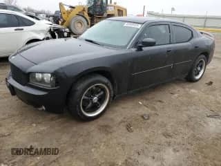 2007 Dodge Charger z VIN 2B3KA43G07H791921, wystawiony jako Copart lot #44059325 z przebiegiem 171 723 mil mil oraz Szkoda całkowita • Salvage title. Historia ofert i sprzedaży dostępna na DreamBid. Obrazek 1.