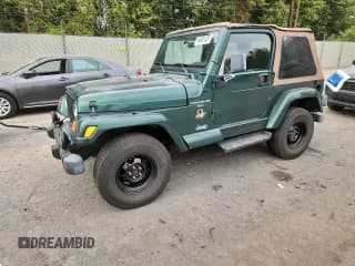 ✅ 2001 Jeep Wrangler Sahara • VIN: 1J4FA59S31P324555 • Lot: 84462425. Listed on Copart with 137,096 mi. Free auction sales archive from the USA and detailed vehicle history report at DreamBid. Image 1.