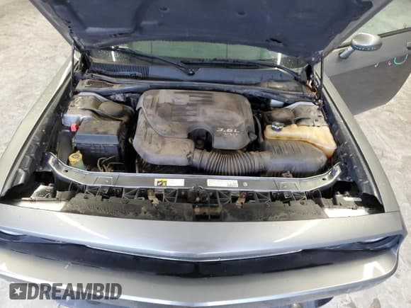 ✅ 2012 Dodge Challenger SXT • VIN: 2C3CDYAG1CH174885 • Lot: 44727385. Wystawiony na Copart z przebiegiem 219 845 mil. Bezpłatny archiwum sprzedaży aukcyjnych z USA i szczegółowy raport historii pojazdu na DreamBid. Zdjęcie 13.