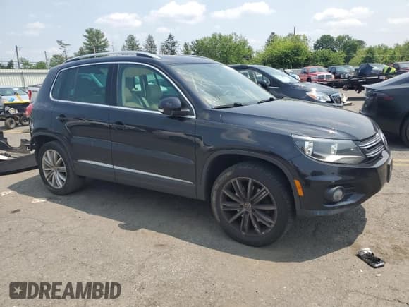 ✅ 2013 Volkswagen Tiguan SE • VIN: WVGBV7AX3DW535952 • Lot: 60476265. Listed on Copart with 126,204 mi. Free auction sales archive from the USA and detailed vehicle history report at DreamBid. Image 4.