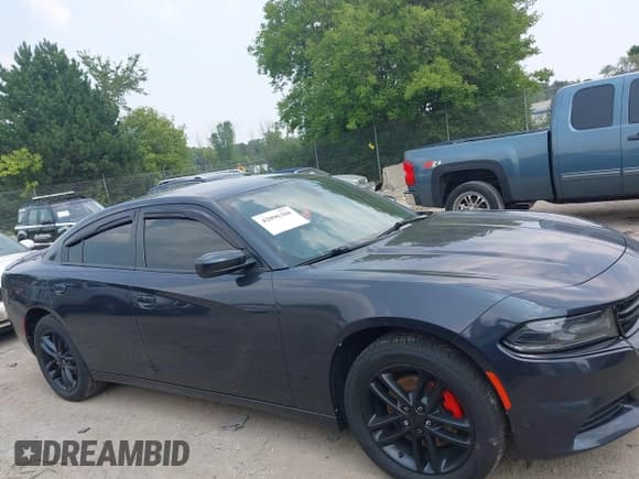 ✅ 2019 Dodge Charger SXT • VIN: 2C3CDXJG4KH639068 • Lot: 42896388. Listed on IAAI with 138,625 mi. Free auction sales archive from the USA and detailed vehicle history report at DreamBid. Image 13.