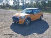 ✅ 2016 MINI Hardtop • VIN: WMWXP5C53G3B14095 • Lot: 43611433. Listed on IAAI with 74,616 mi. Free auction sales archive from the USA and detailed vehicle history report at DreamBid. Image 2.