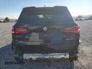 ✅ 2022 BMW X5 M • VIN: 5YMJU0C06N9M19369 • Lot: 83088734. Wystawiony na Copart z przebiegiem 35 382 mil. Bezpłatny archiwum sprzedaży aukcyjnych z USA i szczegółowy raport historii pojazdu na DreamBid. Zdjęcie 6.