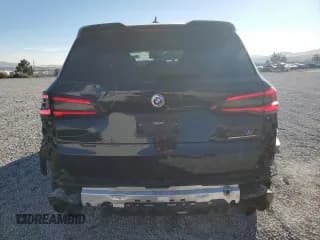 ✅ 2022 BMW X5 M • VIN: 5YMJU0C06N9M19369 • Lot: 83088734. Listed on Copart with 35,382 mi. Free auction sales archive from the USA and detailed vehicle history report at DreamBid. Image 6.