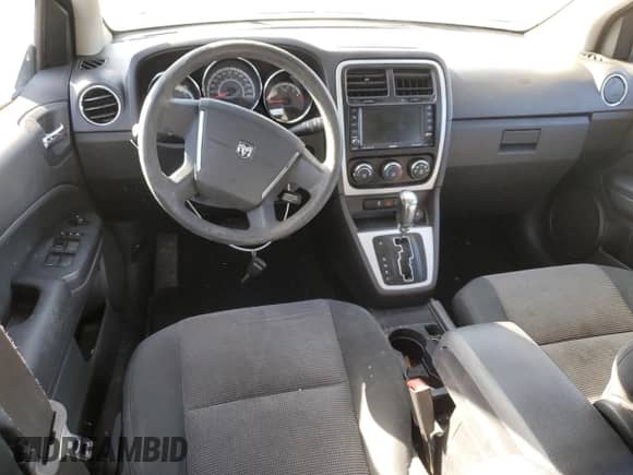 2011 Dodge Caliber Mainstreet с VIN 1B3CB3HA9BD221261, выставлен на аукционе Copart как лот 78911594 с пробегом Не указан миль и Чистый • Clean title. История ставок и продаж доступна на DreamBid. Изображение 8.