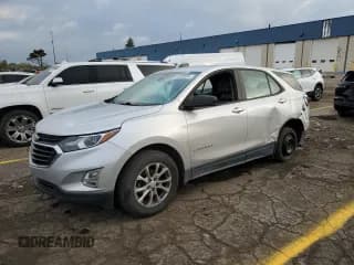✅ 2020 Chevrolet Equinox LS • VIN: 3GNAXHEV1LS670017 • Lot: 82208005. Listed on Copart with 95,729 mi. Free auction sales archive from the USA and detailed vehicle history report at DreamBid. Image 1.