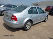 ✅ 2004 Volkswagen Jetta GLS • VIN: 3VWSK69M94M091877 • Lot: 42444900. Listed on IAAI with 126,724 mi. Free auction sales archive from the USA and detailed vehicle history report at DreamBid. Image 4.