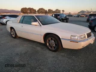 ✅ 2002 Cadillac Eldorado ESC • VIN: 1G6EL12Y72B101231 • Лот: 79971954. Опубликован ранее на Copart с пробегом 87 408 миль. Бесплатный доступ к архиву аукционных продаж из США и подробный отчёт об истории автомобиля на DreamBid. Изображение 4.