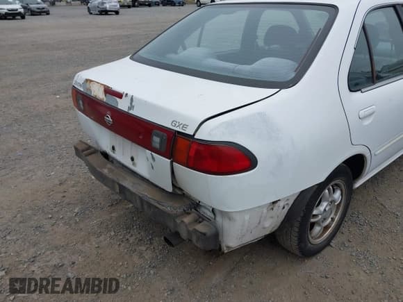 ✅ 1999 Nissan Sentra XE • VIN: 3N1AB41D5XL087871 • Lot: 43173675. Listed on IAAI with 159,204 mi. Free auction sales archive from the USA and detailed vehicle history report at DreamBid. Image 6.