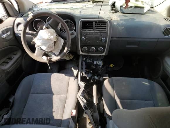 2011 Dodge Caliber Heat z VIN 1B3CB5HAXBD108432, wystawiony jako Copart lot #65934884 z przebiegiem Nie podano mil oraz Szkoda całkowita • Salvage title. Historia ofert i sprzedaży dostępna na DreamBid. Obrazek 8.