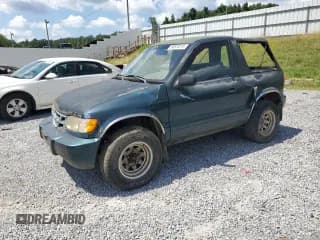 ✅ 1999 Kia Sportage • VIN: KNDJB6230X5587869 • Lot: 80439095. Listed on Copart with 170,561 mi. Free auction sales archive from the USA and detailed vehicle history report at DreamBid. Image 1.