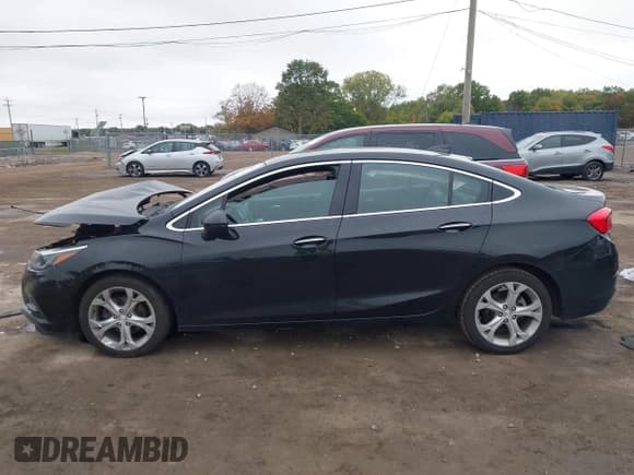 ✅ 2018 Chevrolet Cruze Premier • VIN: 1G1BF5SM1J7141701 • Lot: 43449111. Listed on IAAI with 128,825 mi. Free auction sales archive from the USA and detailed vehicle history report at DreamBid. Image 15.