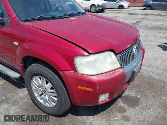 2006 Mercury Mariner Luxury with VIN 4M2YU56156KJ08304, listed as a IAAI auction lot 42990556 with 148,191 mi miles and . Bid and sale history available at DreamBid. Image 14.