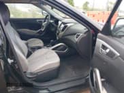 ✅ 2012 Hyundai Veloster w/Gray Int • VIN: KMHTC6AD6CU028810 • Lot: 42818888. Wystawiony na IAAI z przebiegiem 149 283 mil. Bezpłatny archiwum sprzedaży aukcyjnych z USA i szczegółowy raport historii pojazdu na DreamBid. Zdjęcie 5.