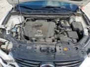 ✅ 2016 Mazda CX-5 Touring • VIN: JM3KE2CY2G0607428 • Лот: 91684385. Опубликован ранее на Copart с пробегом 130 111 миль. Бесплатный доступ к архиву аукционных продаж из США и подробный отчёт об истории автомобиля на DreamBid. Изображение 12.