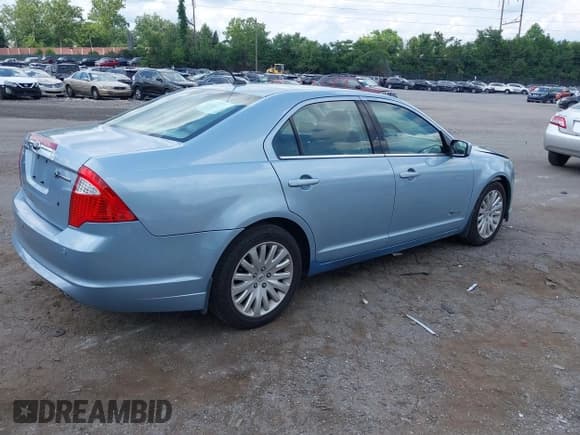 ✅ 2010 Ford Fusion Hybrid • VIN: 3FADP0L34AR294982 • Лот: 42754341. Опубликован ранее на IAAI с пробегом 119 602 миль. Бесплатный доступ к архиву аукционных продаж из США и подробный отчёт об истории автомобиля на DreamBid. Изображение 4.