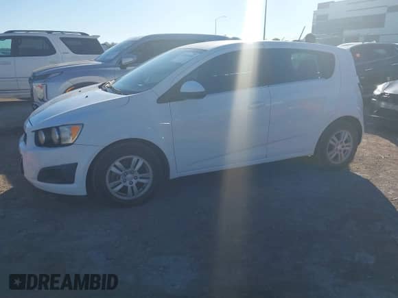2015 Chevrolet Sonic LT with VIN 1G1JC6SH9F4100562, listed as a IAAI auction lot 43593493 with 127,498 mi miles and . Bid and sale history available at DreamBid. Image 2.