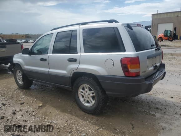 ✅ 2004 Jeep Grand Cherokee Laredo • VIN: 1J4GW48S64C140353 • Lot: 59335125. Listed on Copart with 131,847 mi. Free auction sales archive from the USA and detailed vehicle history report at DreamBid. Image 2.