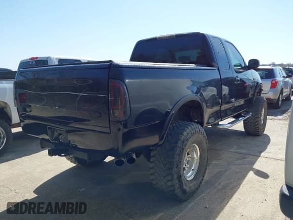 ✅ 1998 Ford F-250 • VIN: 1FTPX28L7WNA79621 • Lot: 41783554. Listed on IAAI with 254,342 mi. Free auction sales archive from the USA and detailed vehicle history report at DreamBid. Image 4.