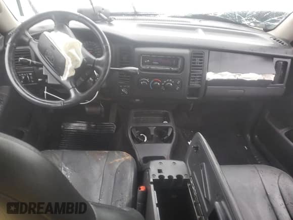 2003 Dodge Dakota Sport z VIN 1D7HG38N83S265442, wystawiony jako Copart lot #84969985 z przebiegiem Nie podano mil oraz Szkoda całkowita • Salvage title. Historia ofert i sprzedaży dostępna na DreamBid. Obrazek 8.