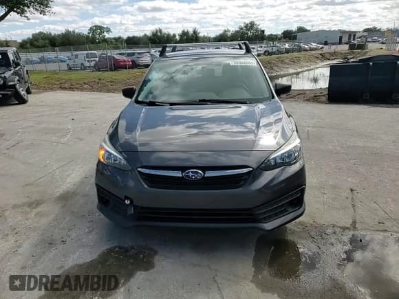 ✅ 2020 Subaru Impreza • VIN: 4S3GKAB69L3613057 • Lot: 90908865. Listed on Copart with 76,774 mi. Free auction sales archive from the USA and detailed vehicle history report at DreamBid. Image 13.