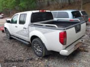 ✅ 2012 Nissan Frontier Pro-4X • VIN: 1N6AD0EV7CC409206 • Lot: 42388170. Listed on IAAI with 126,411 mi. Free auction sales archive from the USA and detailed vehicle history report at DreamBid. Image 3.