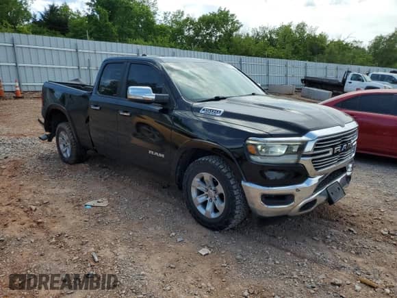 2020 Ram 1500 Laramie with VIN 1C6RREDT0LN265191, listed as a Copart auction lot 57207775 with 124,269 mi miles and Salvage title. Bid and sale history available at DreamBid. Image 4.