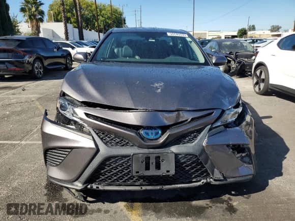 2020 Toyota Camry Hybrid SE с VIN 4T1G31AK8LU535159, выставлен на аукционе Copart как лот 85563505 с пробегом 90 438 миль миль и Списание • Salvage title. История ставок и продаж доступна на DreamBid. Изображение 5.