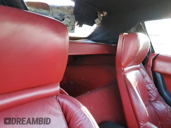 1990 Chevrolet Corvette z VIN 1G1YY3384L5111942, wystawiony jako Copart lot #75481214 z przebiegiem 91 731 mil mil oraz Szkoda całkowita • Salvage title. Historia ofert i sprzedaży dostępna na DreamBid. Obrazek 10.