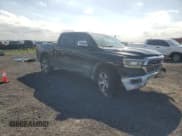 ✅ 2022 Ram 1500 Laramie • VIN: 1C6SRFJT0NN394868 • Lot: 86619065. Listed on Copart with 66,077 mi. Free auction sales archive from the USA and detailed vehicle history report at DreamBid. Image 4.