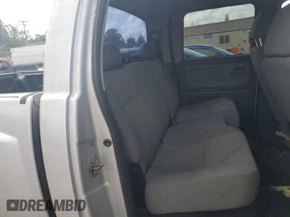 2010 Dodge Dakota Bighorn/Lonestar z VIN 1D7CW3GK0AS175803, wystawiony jako Copart lot #73672824 z przebiegiem Nie podano mil oraz Szkoda całkowita • Salvage title. Historia ofert i sprzedaży dostępna na DreamBid. Obrazek 10.