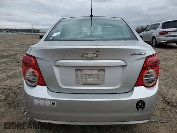 ✅ 2012 Chevrolet Sonic LS • VIN: 1G1JB5SHXC4152839 • Lot: 84397384. Listed on Copart with 132,162 mi. Free auction sales archive from the USA and detailed vehicle history report at DreamBid. Image 6.