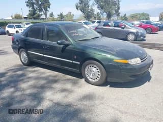 ✅ 2000 Saturn LS • VIN: 1G8JW52R5YY636741 • Lot: 42950746. Listed on IAAI with Not provided. Free auction sales archive from the USA and detailed vehicle history report at DreamBid. Image 1.