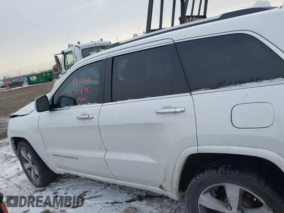 ✅ 2015 Jeep Grand Cherokee Overland • VIN: 1C4RJFCG7FC754178 • Lot: 41554947. Listed on IAAI with 164,413 mi. Free auction sales archive from the USA and detailed vehicle history report at DreamBid. Image 14.