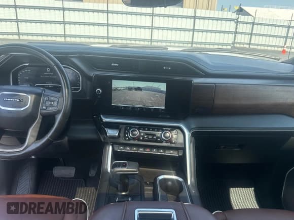 ✅ 2022 GMC Sierra 1500 Denali Ultimate • VIN: 1GTUUHET2NZ514460 • Лот: 65281035. Опубликован ранее на Copart с пробегом 28 550 миль. Бесплатный доступ к архиву аукционных продаж из США и подробный отчёт об истории автомобиля на DreamBid. Изображение 9.