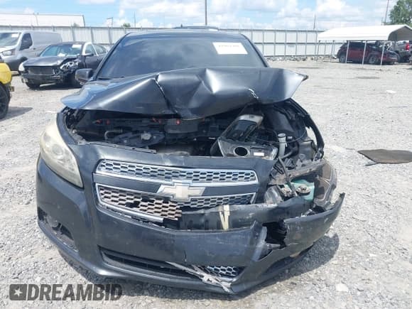 ✅ 2013 Chevrolet Malibu LTZ • VIN: 1G11H5SA6DF190026 • Lot: 42984401. Listed on IAAI with Not provided. Free auction sales archive from the USA and detailed vehicle history report at DreamBid. Image 12.