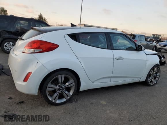✅ 2015 Hyundai Veloster • VIN: KMHTC6AD6FU237811 • Lot: 83592974. Listed on Copart with 122,604 mi. Free auction sales archive from the USA and detailed vehicle history report at DreamBid. Image 3.