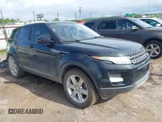 ✅ 2015 Land Rover Range Rover Evoque Pure Premium • VIN: SALVR2BGXFH059920 • Lot: 42325121. Wystawiony na IAAI z przebiegiem 165 618 mil. Bezpłatny archiwum sprzedaży aukcyjnych z USA i szczegółowy raport historii pojazdu na DreamBid. Zdjęcie 1.