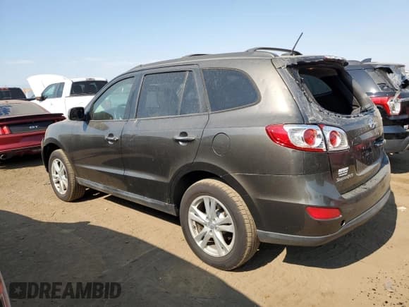 ✅ 2012 Hyundai Santa Fe Limited • VIN: 5XYZKDAG1CG120408 • Lot: 75483254. Listed on Copart with 118,834 mi. Free auction sales archive from the USA and detailed vehicle history report at DreamBid. Image 2.