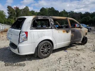 ✅ 2018 Dodge Caravan • VIN: NOVIN000074032014 • Lot: 74032014. Listed on Copart with Not provided. Free auction sales archive from the USA and detailed vehicle history report at DreamBid. Image 3.