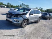 ✅ 2017 Honda Pilot EX-L • VIN: 5FNYF5H7XHB027767 • Lot: 42332282. Listed on IAAI with 50,611 mi. Free auction sales archive from the USA and detailed vehicle history report at DreamBid. Image 2.