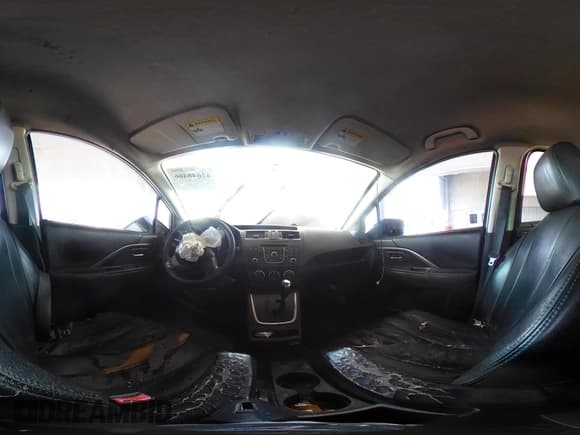 ✅ 2012 Mazda 5 Touring • VIN: JM1CW2CLXC0100950 • Lot: 42648466. Listed on IAAI with 276,752 mi. Free auction sales archive from the USA and detailed vehicle history report at DreamBid. Image 18.