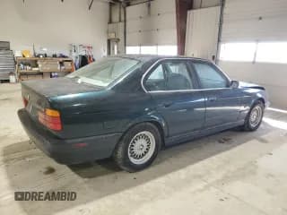 ✅ 1995 BMW 5 Series 525i • VIN: WBAHD6322SGK84827 • Лот: 44963835. Опубликован ранее на Copart с пробегом 230 669 миль. Бесплатный доступ к архиву аукционных продаж из США и подробный отчёт об истории автомобиля на DreamBid. Изображение 3.